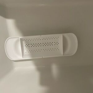 Expendable Bath Tub Caddy Tray Holder Shelf organizer.